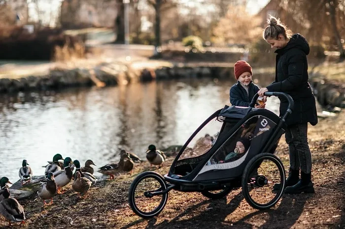 HAMAX Cocoon One - jednoosobowa przyczepka rowerowa z zestawem do biegania | Green/Black